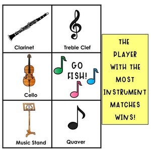 May include: A game board with images of musical instruments and musical notes. The text on the board says "Go Fish!" and "The player with the most instrument matches wins!"