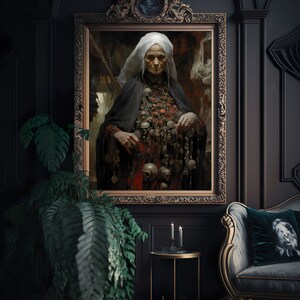 May include: A framed oil painting of an elderly woman wearing a white head covering and a dark robe. She is holding a string of skulls in her hands. The painting is set against a dark background.