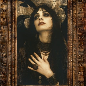 May include: A woman with dark hair and dark eyes is wearing a dark dress and jewelry. She is looking up and has her hand on her chest. Two ravens are perched on a branch behind her. The image is framed in a dark wood frame.
