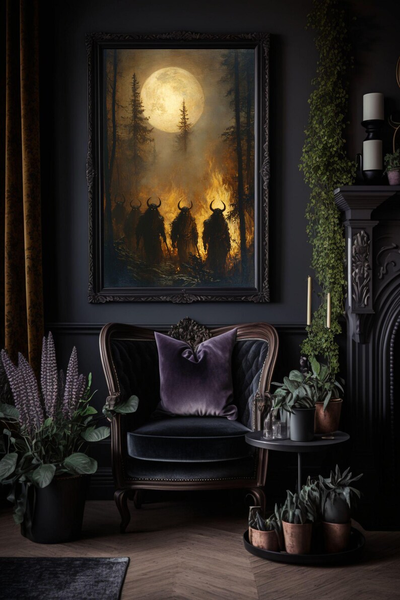 May include: A dark living room with a black velvet armchair, a side table with potted plants, and a framed painting of three figures in a forest with a full moon. The painting has a dark, moody aesthetic.