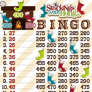 May include: A Christmas bingo card with a fireplace and stockings at the top. The card has numbers from 24 to 475, with the numbers 250, 300, and 350 in the center. The text "The Stockings Were Hung..." is at the top of the card.