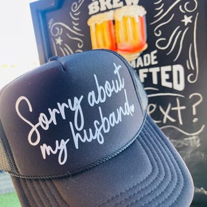 Sorry about my Husband TRUCKER Hat