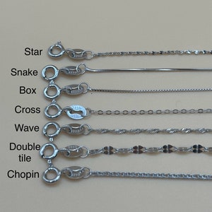 May include: Close-up of ten different silver chain styles, including Star, Snake, Box, Cross, Wave, Double Tile, and Chopin. Each chain is shown with a clasp.
