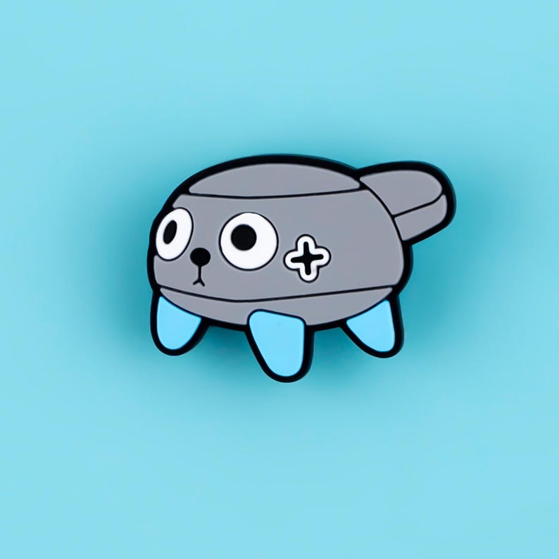 May include: A gray enamel pin shaped like a cartoon creature with a rounded body, large white eyes with black pupils, a small black nose, and a black mouth. The creature has three light blue legs and a black plus sign symbol on its side.