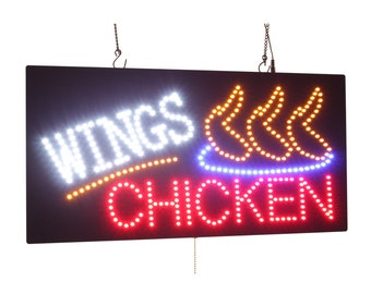 May include: A black sign with white LED lights that reads "WINGS CHICKEN". The sign also has a graphic of three yellow chicken wings with a blue outline.