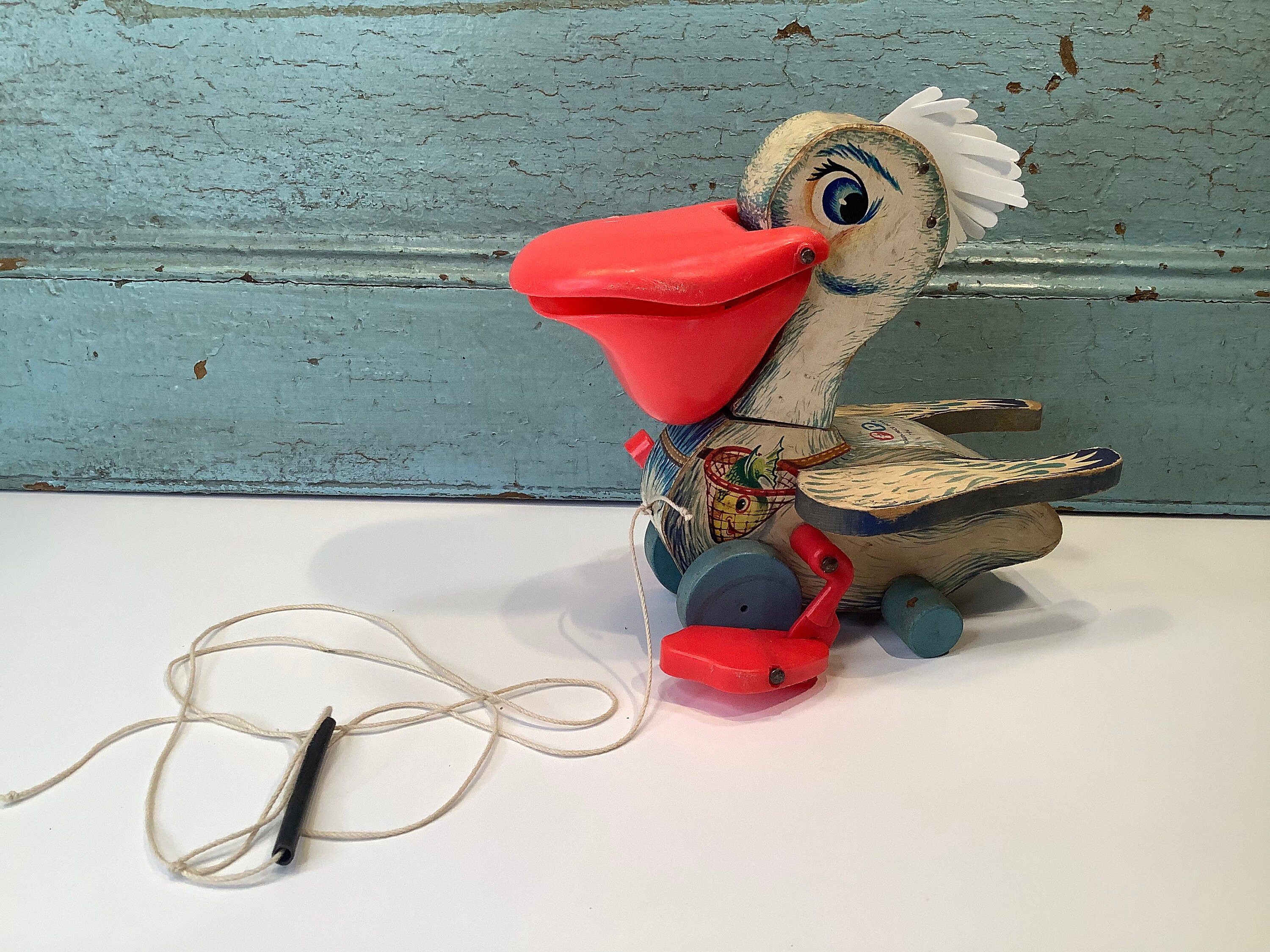 Fisher price pelican pull cheap toy