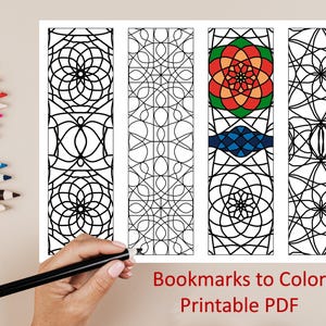 May include: Four printable bookmarks with geometric designs to color. The bookmarks are black and white with intricate patterns. The text "Bookmarks to Color Printable PDF" is at the bottom of the image.