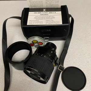 Sigma Multi Coated 600mm f/8 Macro Mirror Lens for Canon Film Camera with Filters and Case