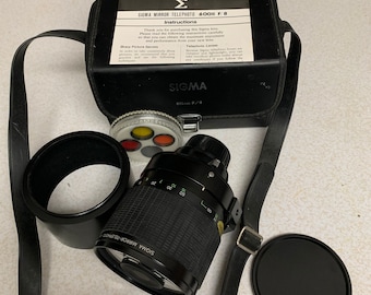 Sigma Multi Coated 600mm f/8 Macro Mirror Lens for Canon Film Camera with Filters and Case