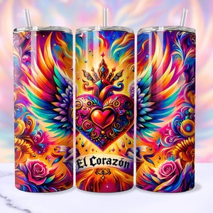May include: A stainless steel tumbler with a colorful design featuring a heart with wings and the text "El Corazón".