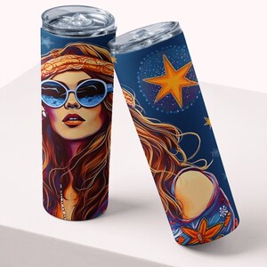 May include: Two stainless steel tumblers with a colorful design featuring a woman with long brown hair wearing sunglasses and a headband. The design also includes a large yellow star and other stars on a blue background.