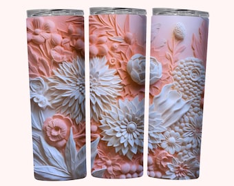 May include: A floral-themed tumbler with a detailed, embossed design. The tumbler features a repeating pattern of white and peach-colored flowers, leaves, and other botanical elements. The design is three-dimensional, creating a textured appearance.