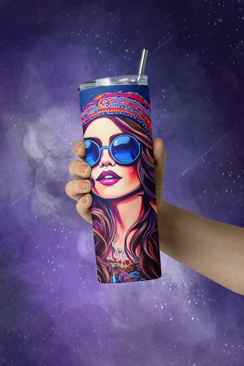 May include: A stainless steel tumbler with a colorful illustration of a woman wearing sunglasses and a headband. The woman has long brown hair and is wearing a colorful patterned shirt.