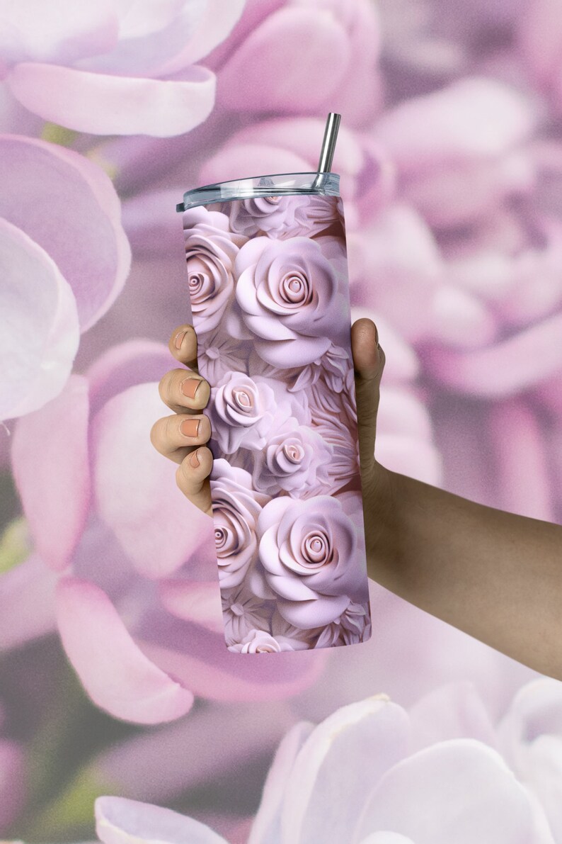 human hand holding a pretty floral tumbler with a  wrap digital design sublimation png.  a 3d design featuring pink roses in a carved effect.  roses floral 3d carved effect tumbler wrap