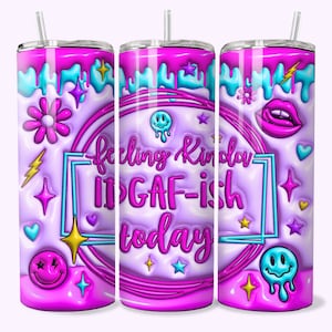 May include: A pink and blue stainless steel tumbler with a dripping design and the text "Feeling kinda IDGAF-ish today".