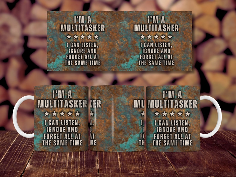 May include: A white ceramic mug with a rusty metal design. The mug features the text "I'm a Multitasker" with five stars and the text "I can listen, ignore and forget all at the same time".
