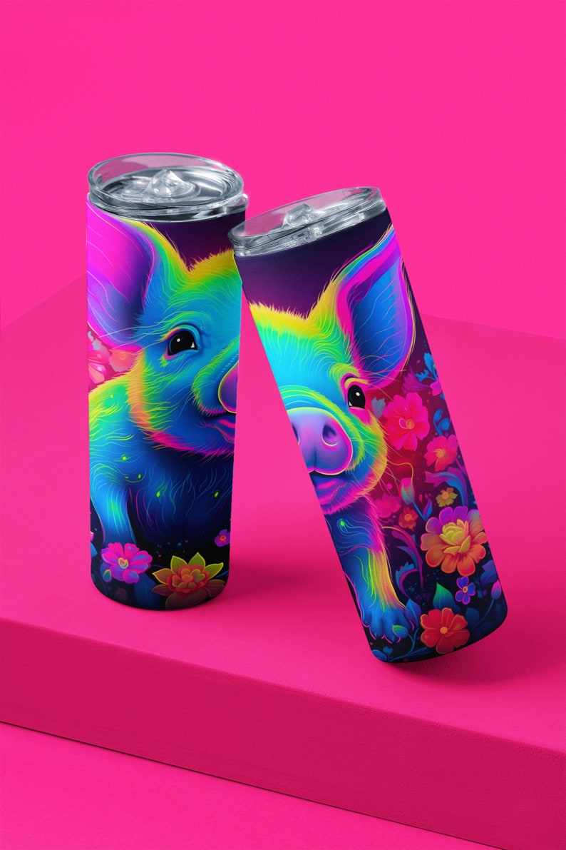 May include: Two stainless steel tumblers with a colorful, psychedelic pig design. The pig is surrounded by flowers and has a bright blue, green, yellow, and pink color scheme.