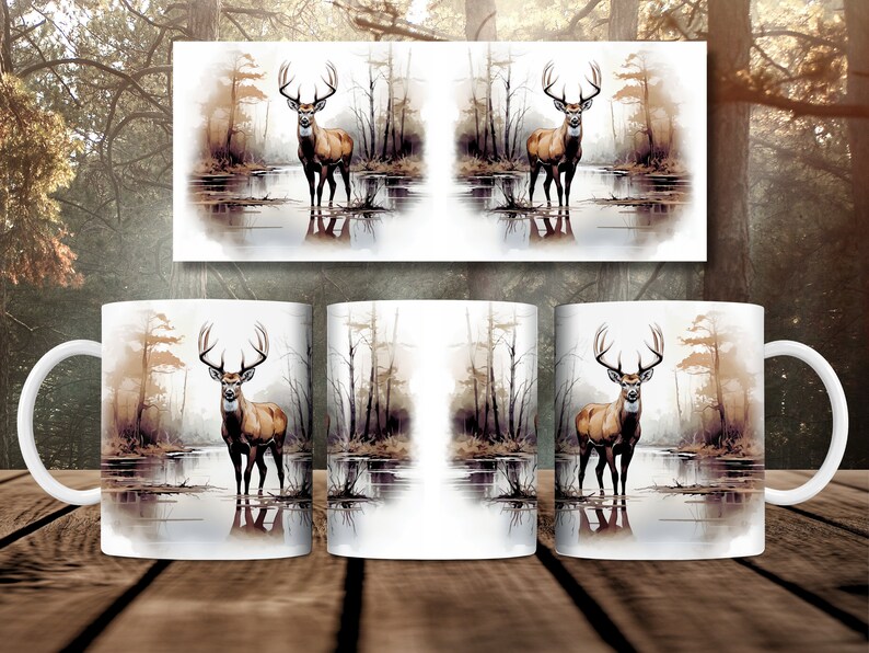 May include: White ceramic mug with a brown deer standing in a lake with trees in the background. The deer is looking directly at the viewer.