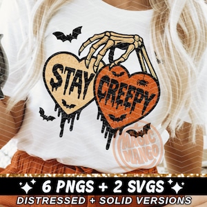 digital design sublimation png or cut file svg. the funny halloween image is two hearts being held by a skeleton hand and the words stay creepy