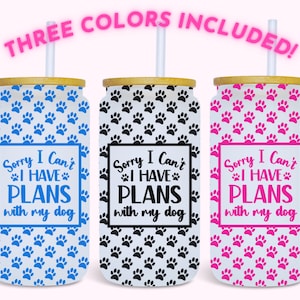 May include: Three stainless steel tumblers with lids and straws. Each tumbler has a white background with a paw print pattern and the text "Sorry I Can't I HAVE PLANS with my dog". The paw prints are blue, black, and pink.
