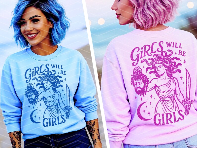 May include: Light blue sweatshirt with a graphic of Medusa holding a severed head and a sword, with the text "GIRLS WILL BE GIRLS". The design is in a darker shade of blue. The image shows the sweatshirt on a person.