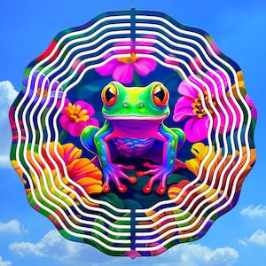 May include: A colorful metal wind spinner with a green frog and pink flowers. The wind spinner has a circular shape with white wavy lines.