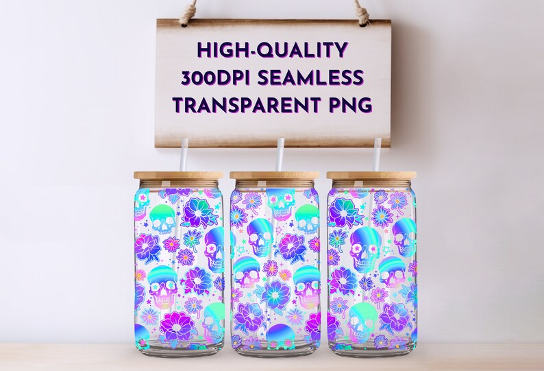 May include: Three clear glass tumblers with a colourful pattern of skulls and flowers. The tumblers have a wooden lid and a straw.