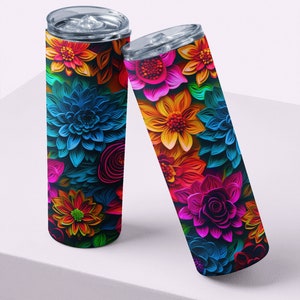 May include: Two stainless steel tumblers with colorful floral designs. The tumblers are decorated with a variety of flowers in shades of pink, blue, yellow, orange, and red. The flowers are arranged in a layered, 3D style, creating a unique and eye-catching design.