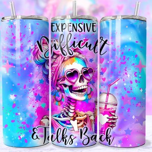 May include: A stainless steel tumbler with a colorful design featuring a skull with a flower crown and the text "Expensive, Difficult & Talks Back".
