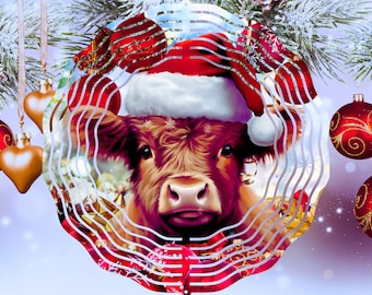 May include: A brown and white cow wearing a red Santa hat with white trim. The cow is surrounded by a red and white striped circle with a white background. The image has a festive Christmas theme.
