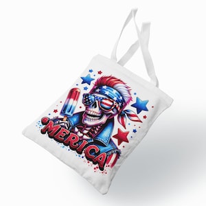 May include: White tote bag with a red, white, and blue skull wearing sunglasses and a bandana holding a red, white, and blue popsicle. The text "MERICA" is printed on the bag.