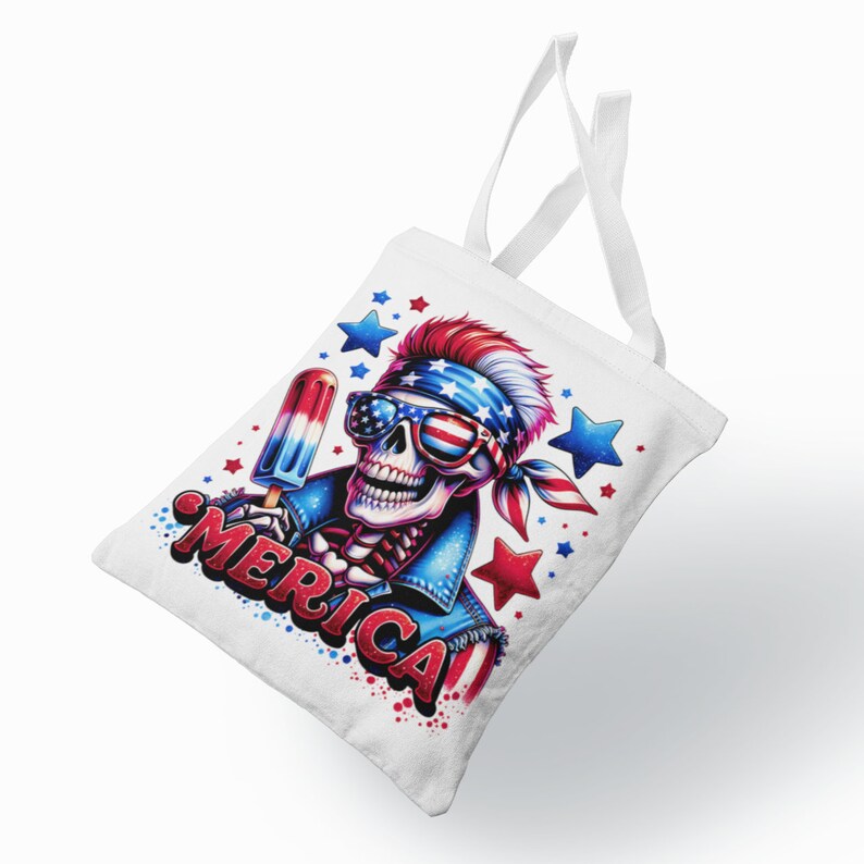 May include: White tote bag with a red, white, and blue skull wearing sunglasses and a bandana holding a red, white, and blue popsicle. The text "MERICA" is printed on the bag.