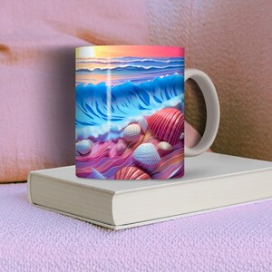 May include: A white ceramic mug with a colorful image of an ocean wave crashing on a beach with seashells. The image features shades of blue, pink, and orange.
