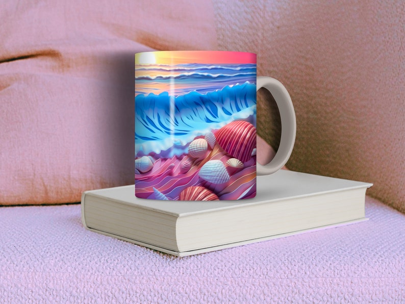 May include: A white ceramic mug with a colorful image of an ocean wave crashing on a beach with seashells. The image features shades of blue, pink, and orange.