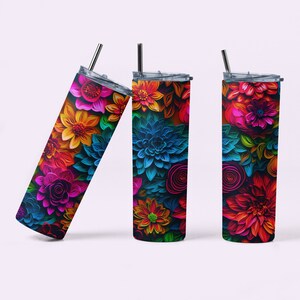 May include: Three stainless steel tumblers with colorful floral designs. The tumblers have lids and straws. The flowers are in shades of pink, blue, yellow, orange, and red.