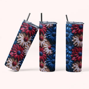 Pu&ograve; includere: Tre bicchieri in acciaio inossidabile con coperchi e cannucce. I bicchieri sono decorati con un motivo floreale rosso, bianco e blu.
