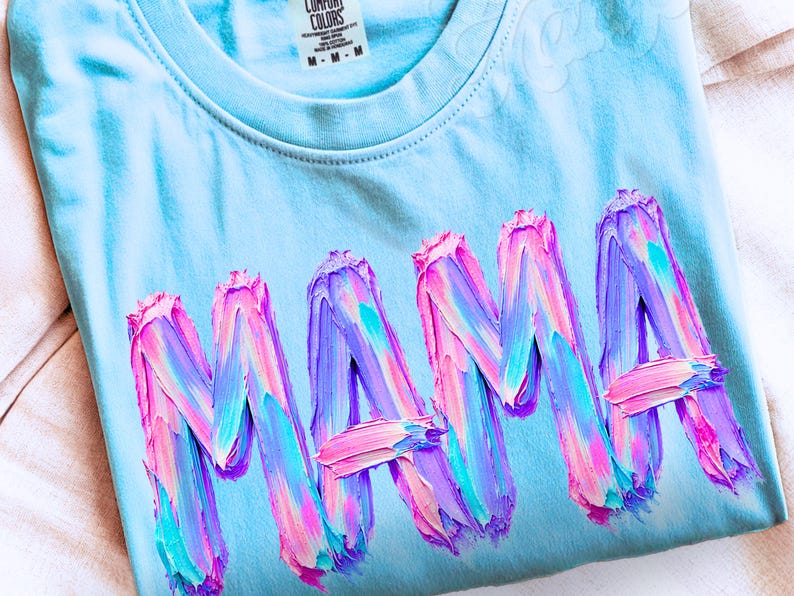 The word "MAMA" rendered in a thick, three-dimensional impasto oil paint style. The bold, capitalized letters are formed from heavy, visible brushstrokes in a vibrant swirling blend of bright pink, cyan blue, and deep lavender. The textured paint creates a high-relief, artistic effect with rich, tactile details. This expressive, painterly design features a modern and energetic aesthetic, appearing as if sculpted from thick, layered, wet oil paint.