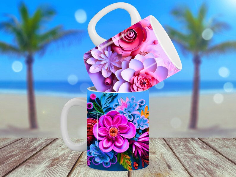 K&ouml;nnte beinhalten: Zwei wei&szlig;e Keramikbecher mit Blumendesigns. Der obere Becher hat rosa, wei&szlig;e und lila Blumen. Der untere Becher hat blaue, rosa und gr&uuml;ne Blumen.