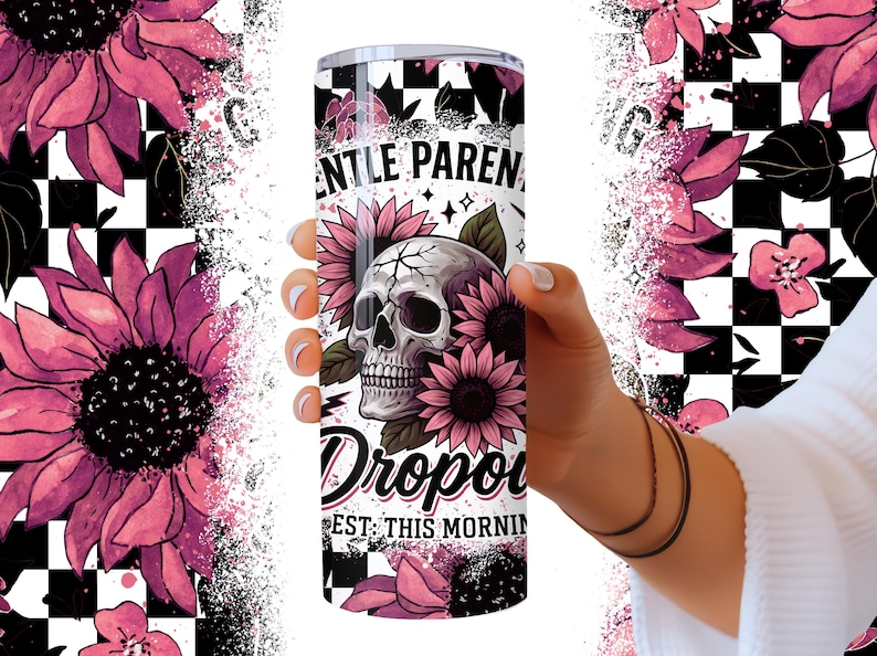 May include: A white tumbler with a black and white checkered background. The tumbler has a pink and black skull with flowers and the text "Gentle Parents Drop Out Est. This Morning".