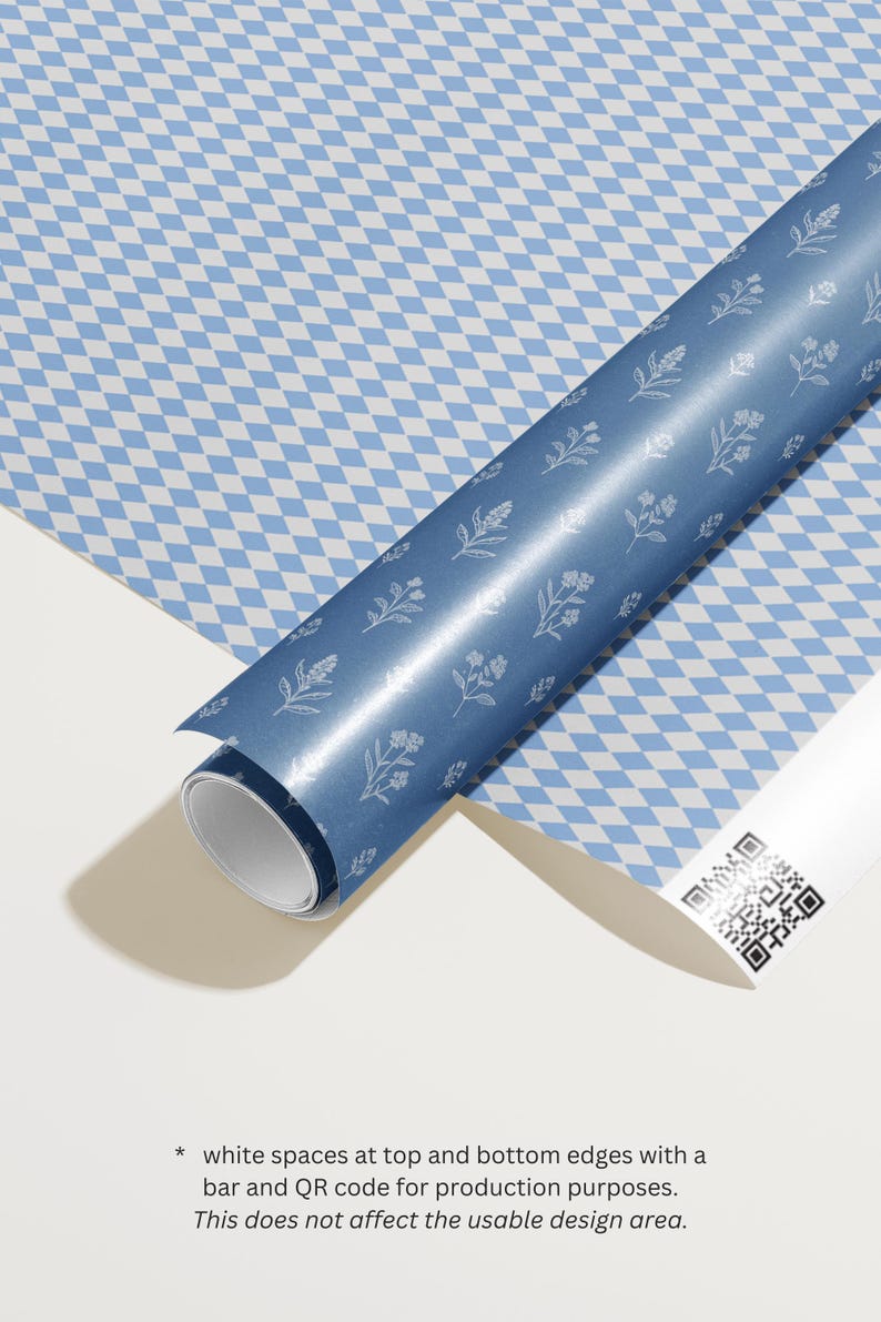 May include: A roll of blue wrapping paper with a floral design and a white and blue diamond pattern. The paper is partially unrolled, revealing the pattern. A white tube with a QR code is also visible.