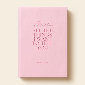 May include: Pink hardback journal with the text "Christina ALL THE THINGS I WANT TO TELL YOU LOVE, SARAH" printed in pink.