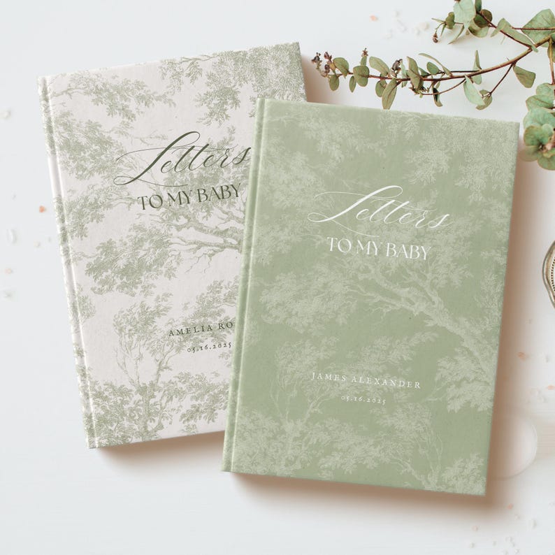 May include: Two green and white patterned hardcover journals with the text "Letters to My Baby" on the front. The journal on the left has the name "Amelia Rose" and the date "03.16.2023" printed on the front. The journal on the right has the name "James Alexander" and the date "03.16.2023" printed on the front.