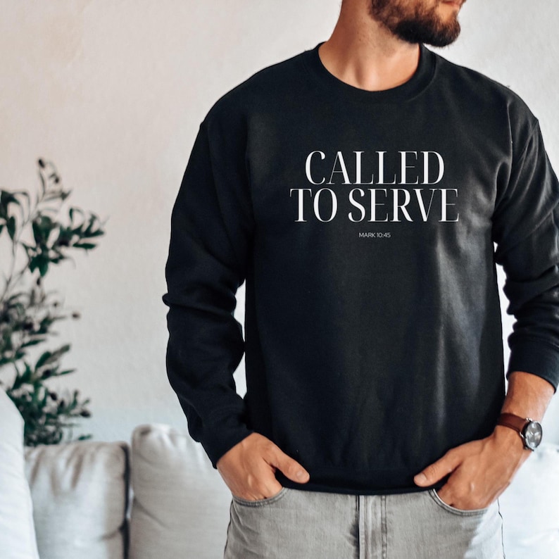 May include: Black sweatshirt with white text that reads "Called to Serve" and "Mark 10:45".