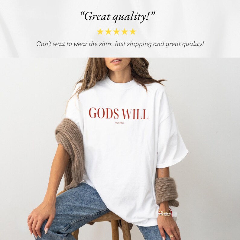 May include: White oversized t-shirt with the text "GODS WILL" in red lettering. The shirt is being worn by a person.