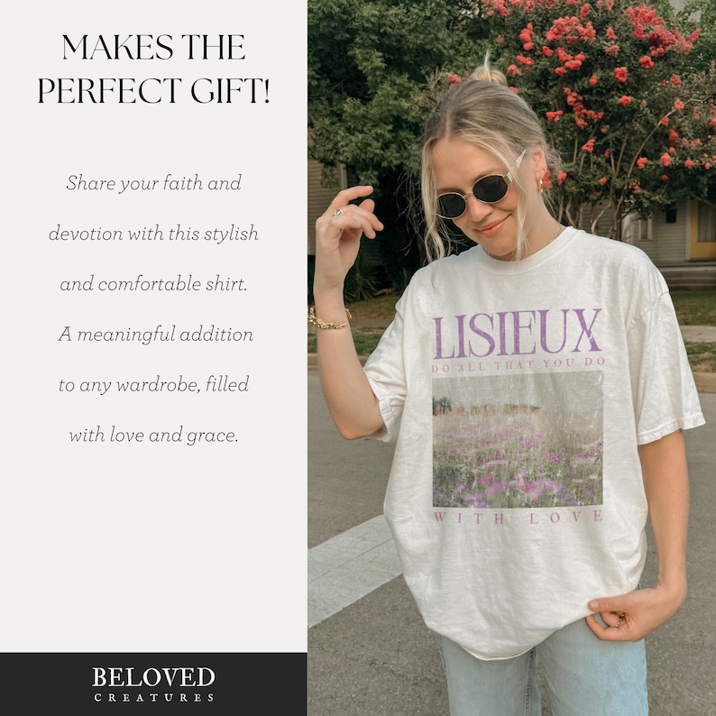 May include: White t-shirt with the word "LISIEUX" in purple, along with the text "DO ALL THAT YOU DO" and "WITH LOVE". The shirt features a floral design and is worn by a person outdoors.