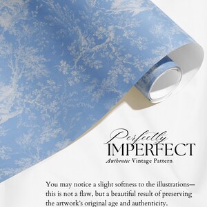 May include: A roll of blue and white patterned wallpaper with a vintage design. The pattern features a detailed illustration of trees and foliage. The text "Perfectly Imperfect" and "Authentic Vintage Pattern" are visible.