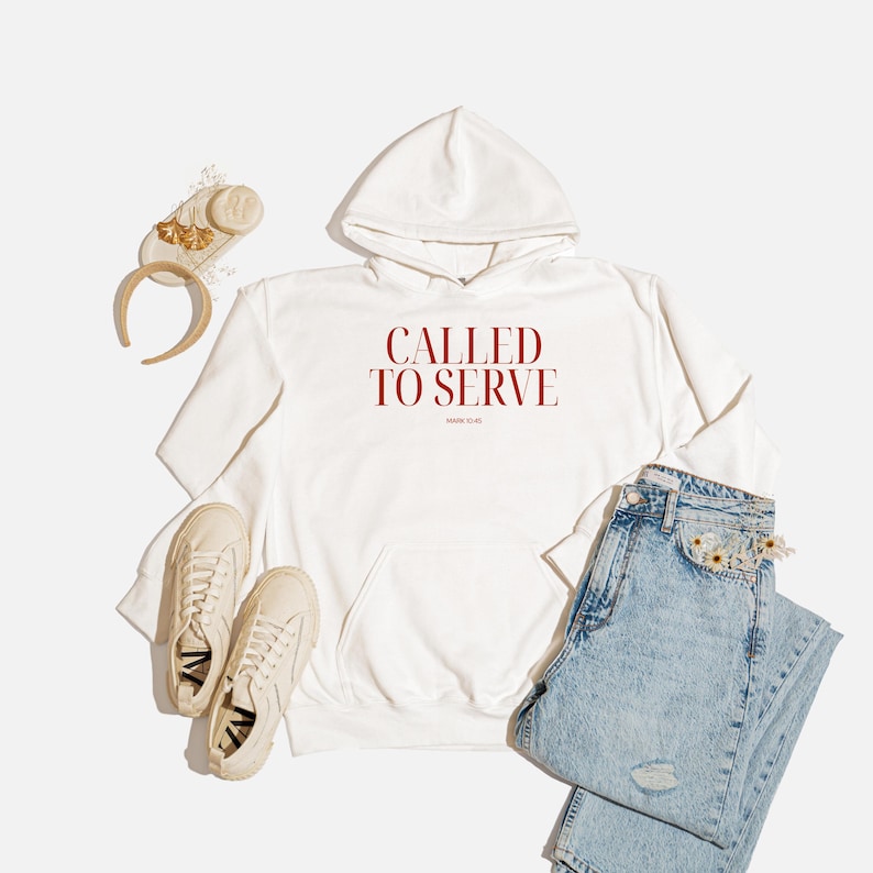 May include: White hoodie with a red print that says "Called to Serve" with the words "Made with Love" in smaller font below.