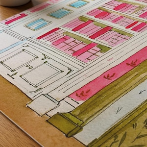May include: Watercolor painting of a building interior with pink bookshelves, blue windows, and a white door. The artwork features a detailed architectural design with a warm color palette and delicate brushstrokes. The overall theme is a cozy, inviting space.