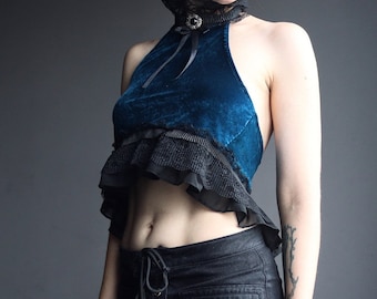 Blue velvet open back top with lace decoration