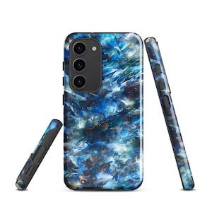 May include: A set of three phone cases with a blue and white abstract design. The cases are shown from different angles, showcasing the design on the front and sides. The design has a watercolor effect.